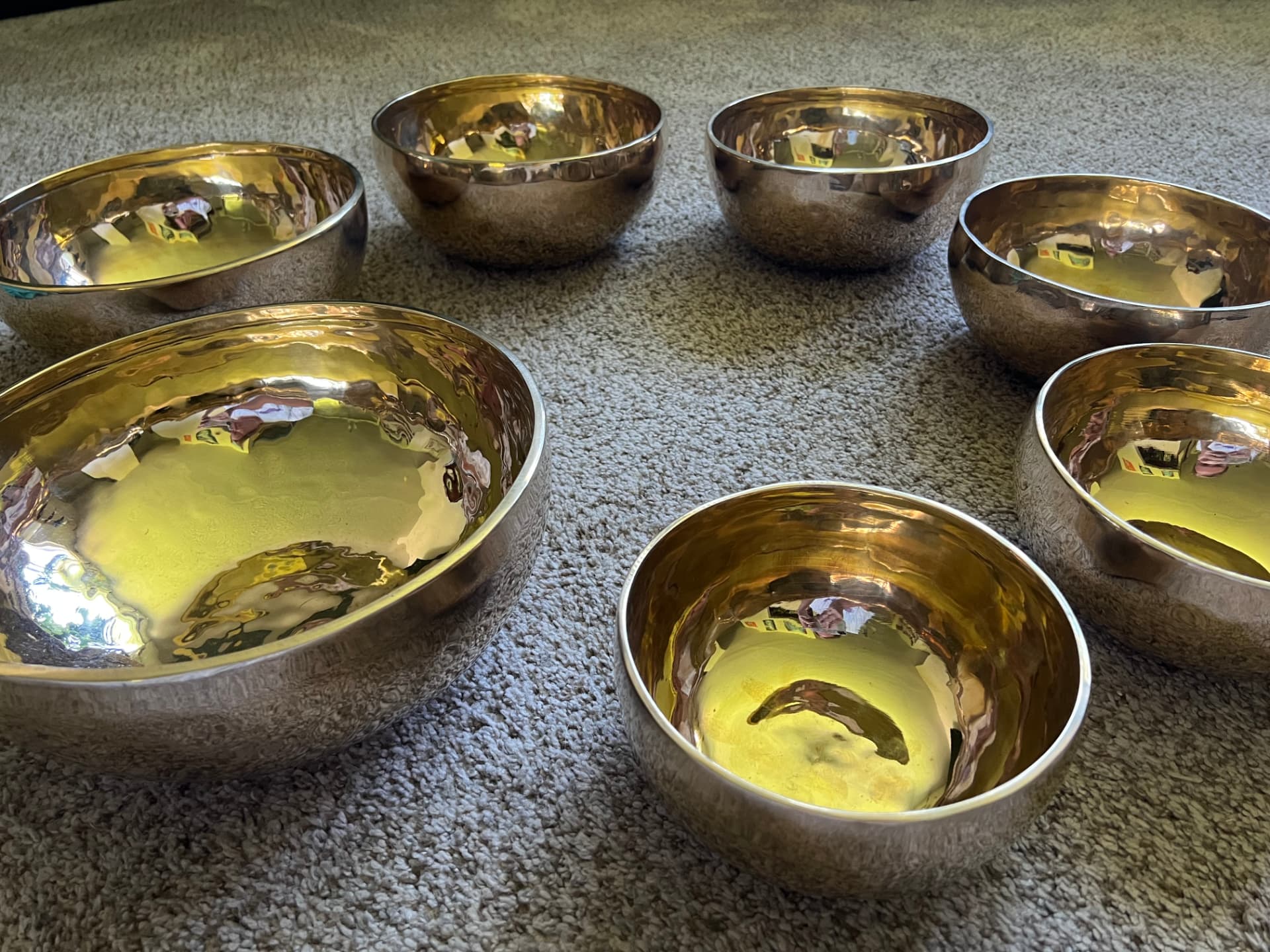 Handmade Tibetan sound bowls arranged for meditation
